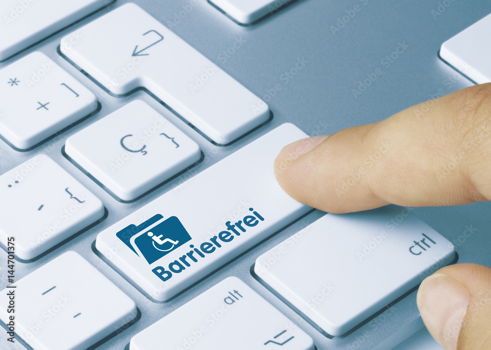 Barrierefreie Webseiten-Zugang (Credit: Adobe Stock) Nahaufnahme, rechte Tastaturbereich, Taste mit Aktenicon, Rollstuhl Icon und dem Wort Barrierefrei wird von einem Finger gedrückt.